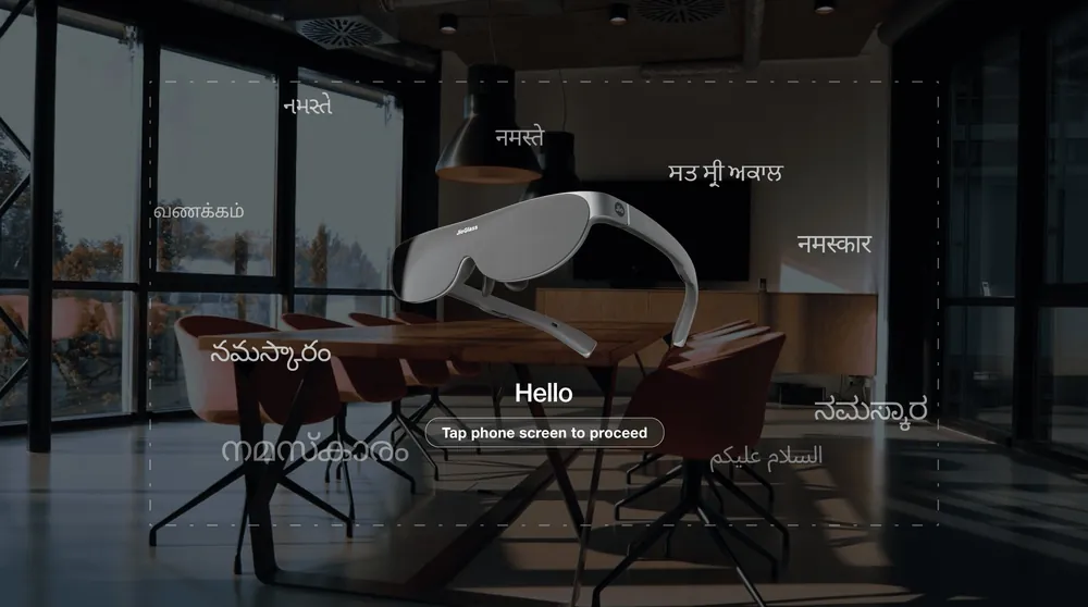 JioGlass onboarding, with Hello in several languages over a conference room.